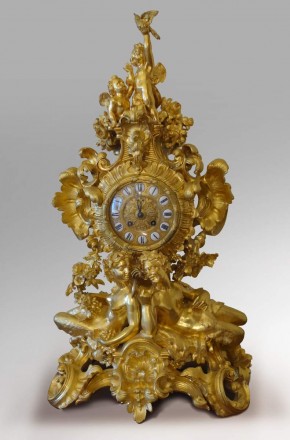 Часы каминные, бронзовые, золоченые с фигурами сатира и сатирессы (второй рокайль)