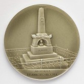 Медаль в честь А. С. Пушкина с изображением могилы поэта